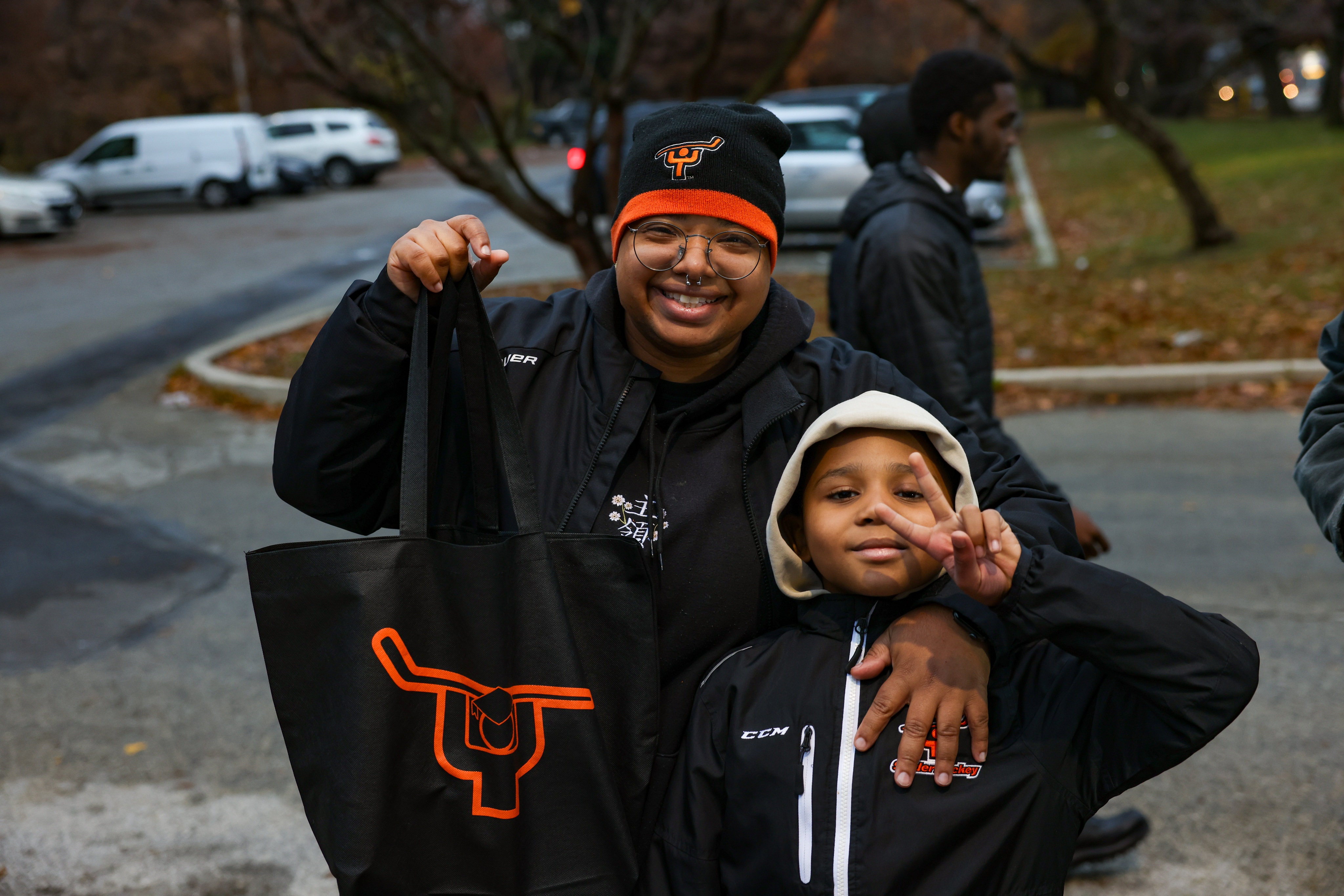 Snider students, staff, and volunteers distribute 250 Thanksgiving meals to community members